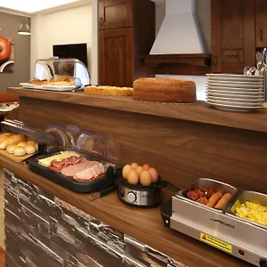 ** Alojamento de Acomodação e Pequeno-almoço J24 Itália